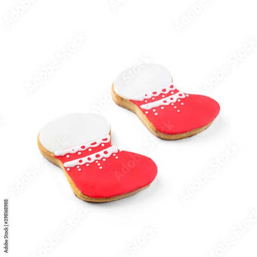 Christmas gingerbread boots cookies isolated on white background. Winter baking at Xmas or New Year holiday