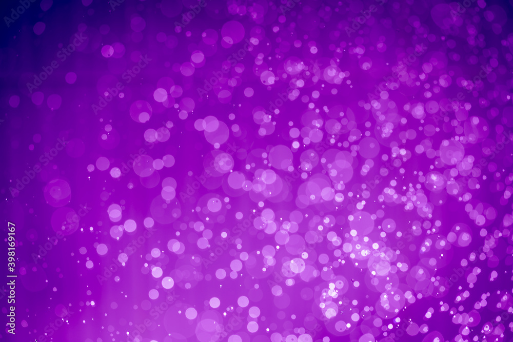 Abstract violet purple glitter lights defocused bokeh