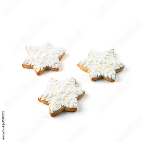 Merry Christmas gingerbread snowflakes cookies isolated on white background. Winter baking at Xmas or New Year holiday