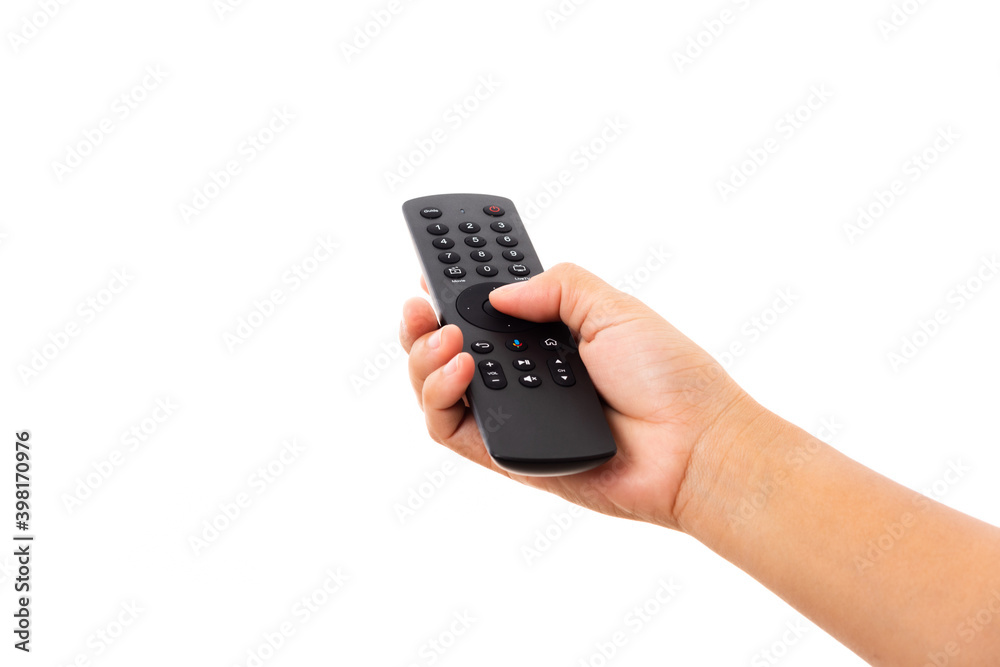 Hand holding television and audio remote control panel, studio shot isolated on over white background, Television wall broadcasting concept Hand holding television and audio remote control panel, studio shot isolated on over white background, Television wall broadcasting concept