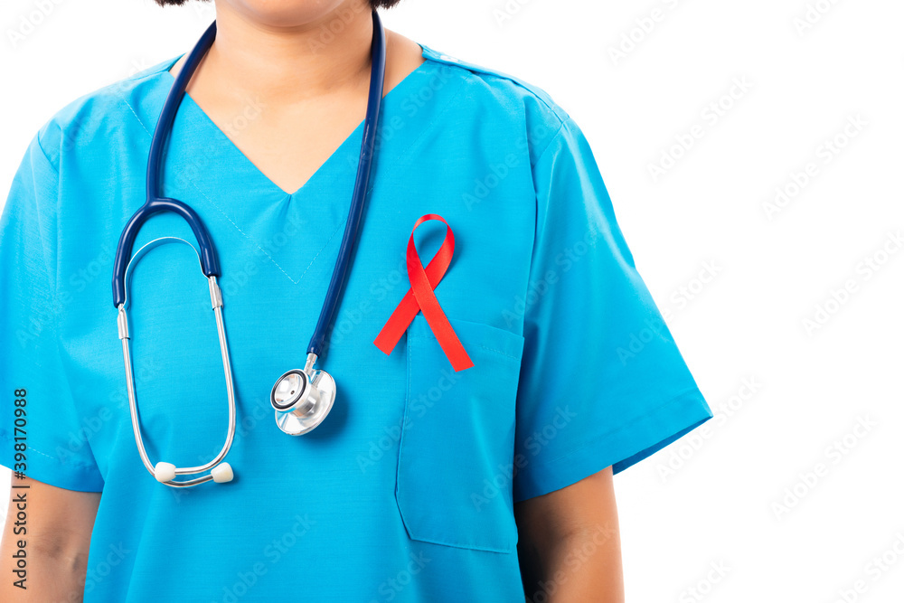 Woman nurse in clinic uniform with support HIV AIDS awareness red ribbon on the chest in studio shot isolated on over white background, Healthcare and medicine, World aids day concept