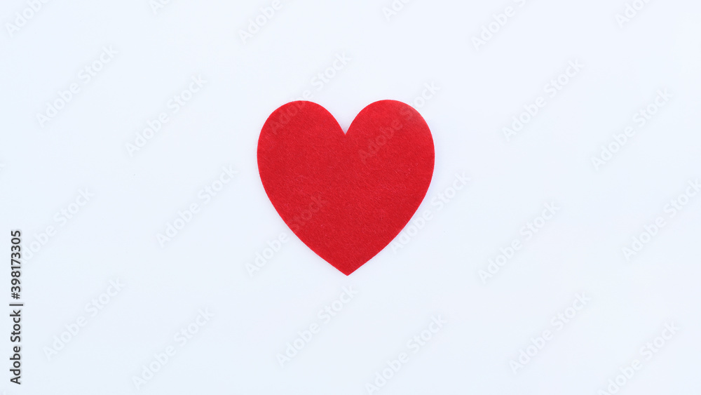 close up of red heart isolated on white background close up of red heart isolated on white background