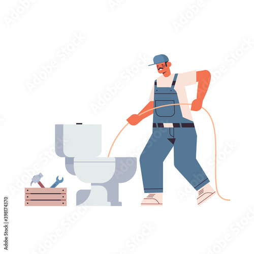 professional worker plumber in uniform using sewer snake cleaning blockage in toilet repair service concept full length isolated vector illustration