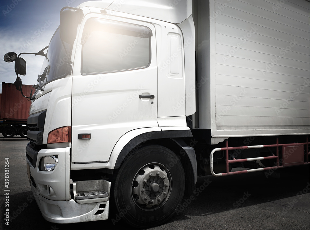 Front white cargo truck parking. Industry cargo freight transportation.