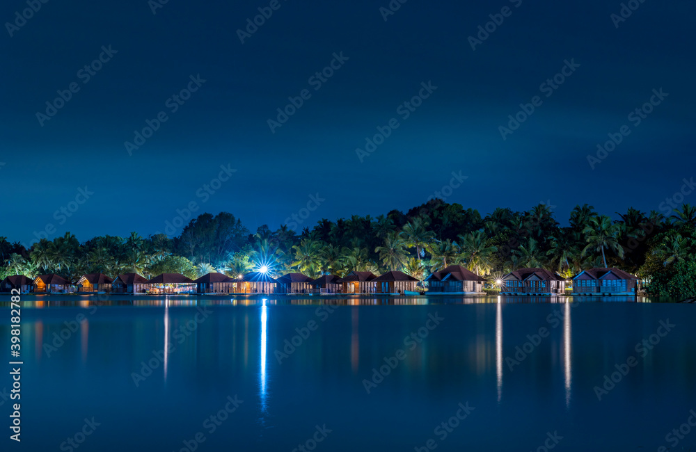 Floating cottages in Poovar island, Poovar Lake at night. Thiruvananthapuram, Kerala, India.