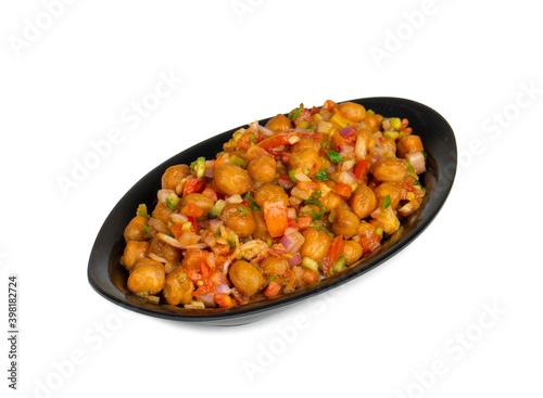 Indian Street Breakfast Chana Chaat Also Know as Chana Masala, Chola Chana Chaat, Chola Masala, Chickpea Masala, Black Chickpea Chaat or Kala Chana Chat on White Background