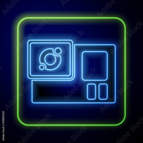 Glowing neon Action extreme camera icon isolated on blue background. Video camera equipment for filming extreme sports. Vector.