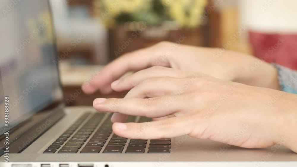 Typing on keyboard. Female hands typing on keyboard from side view closeup 4K. Business woman working home office using laptop. Using technology working productive. Typing on keyboard. Female hands typing on keyboard from side view closeup 4K. Business woman working home office using laptop. Using technology working productive.