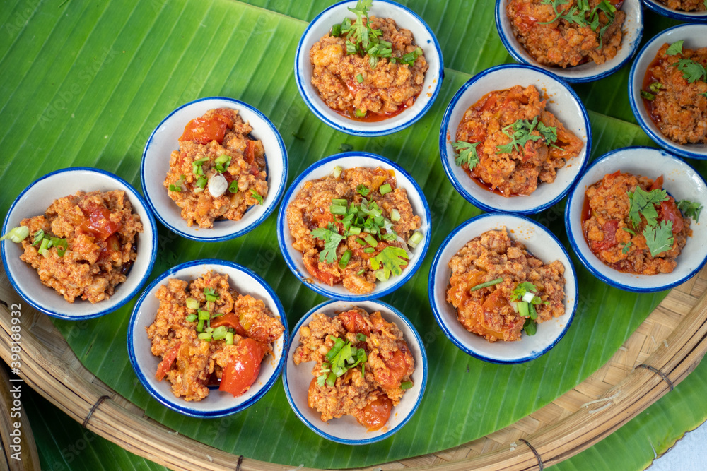 Northern Thai food (Spicy Northern Thai Pork and Tomato dip). Northern Thai food (Spicy Northern Thai Pork and Tomato dip).