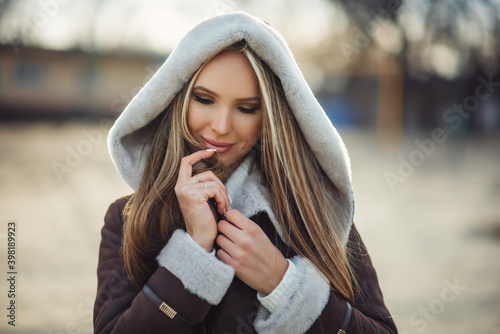 Fotografija fashion outdoor photo of gorgeous sensual woman with blond hair in elegant cloth