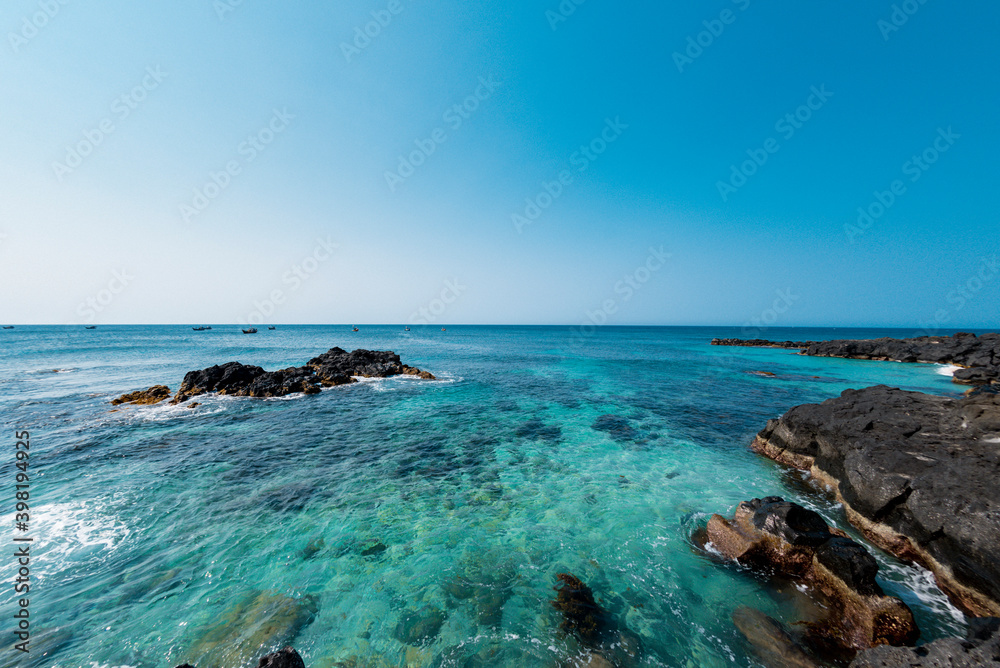 Beautiful landscape of the beach with local colorful basket boats at Ly Son island, Quang Ngai Province, Viet Nam Beautiful landscape of the beach with local colorful basket boats at Ly Son island, Quang Ngai Province, Viet Nam