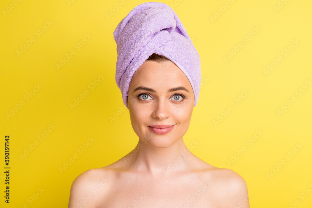 Close-up portrait of pretty cheery girl wearing turban on head fresh pure soft skin isolated over bright yellow color background Close-up portrait of pretty cheery girl wearing turban on head fresh pure soft skin isolated over bright yellow color background