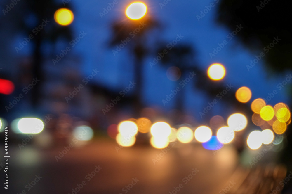 Out of focus defocused blurred bokeh of cars and traffic lights at night on city street. Out of focus defocused blurred bokeh of cars and traffic lights at night on city street.