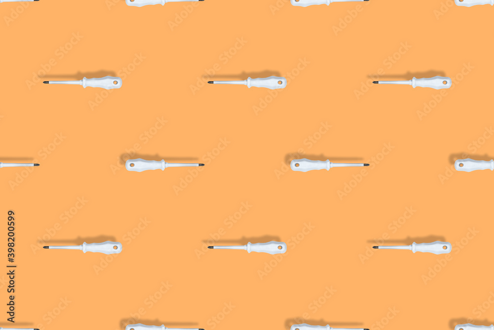 Rubberized metal screwdriver. Screwdriver seamless pattern. Background on the theme of tools.