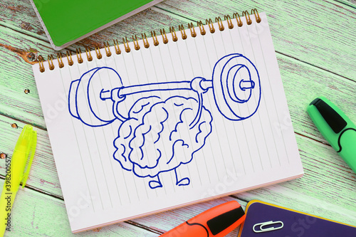 Brain training rock the muscles with a barbell. Creative idea concept. photo