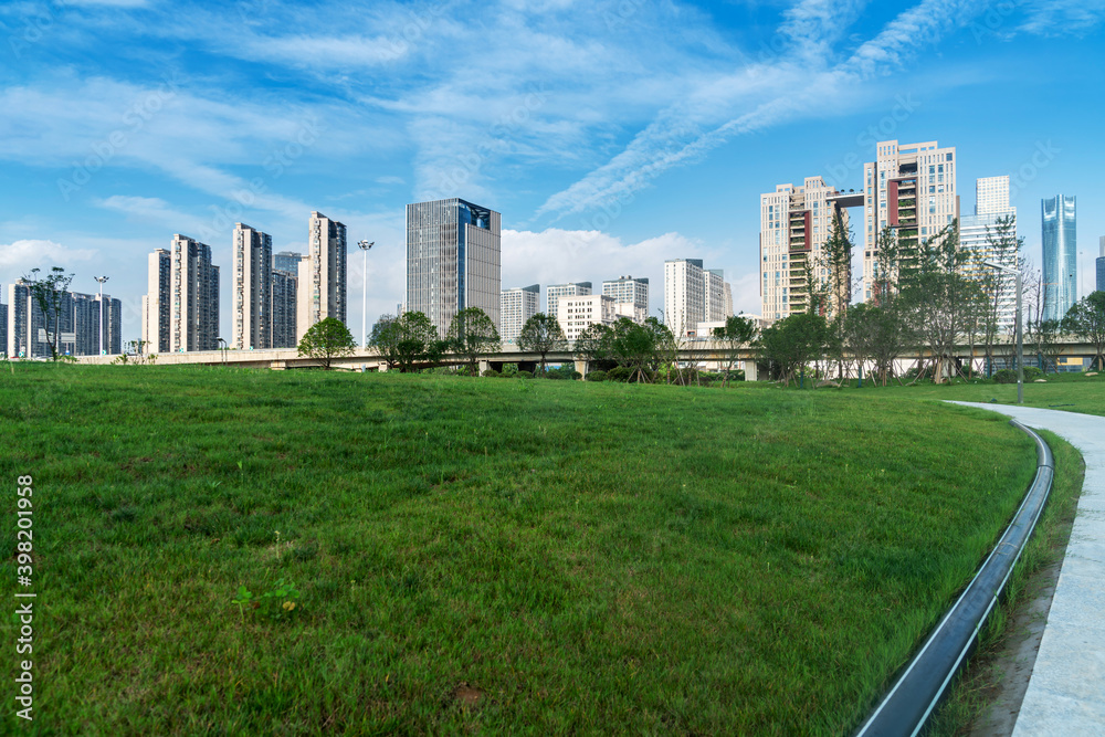 Obraz premium city park with modern building background in shanghai