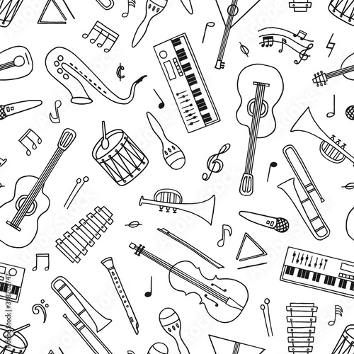 Hand drawn musical instruments seamless pattern in doodle style on white. 