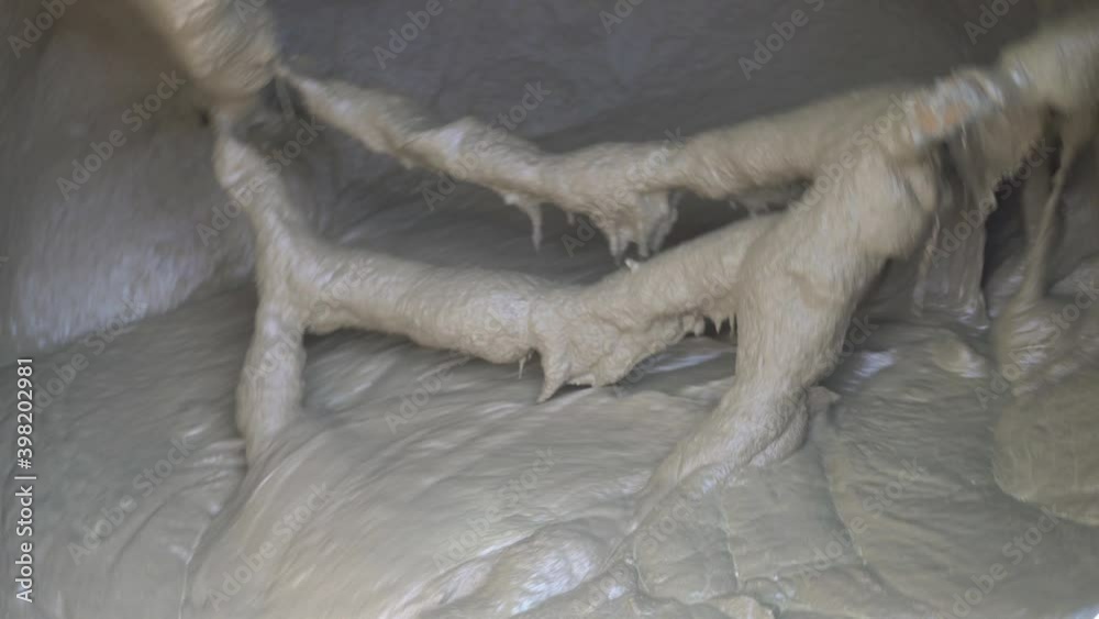 concrete mortar in Concrete mixer,close up inside working concrete mixer concrete mortar in Concrete mixer,close up inside working concrete mixer