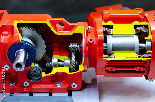 Obraz na plátne Close-up of cross-section helical gearbox with motor