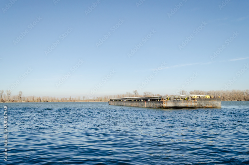 Anchored tankers on the Danube River in Petrovaradin, Novi Sad, Serbia 