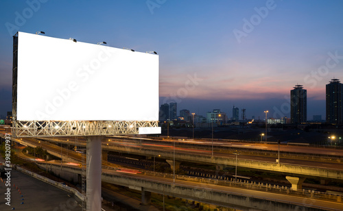 Blank billboard on light trails, street and urban
