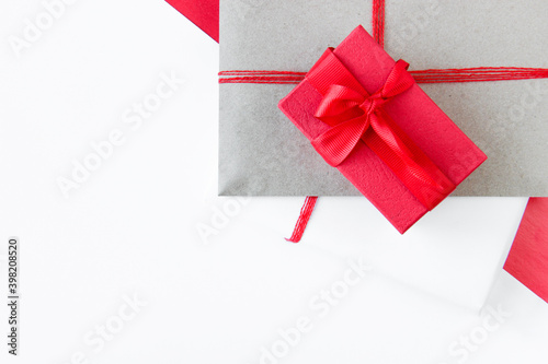 Gifts in bright packaging, a box with a ribbon. Packing gifts, giving gifts.