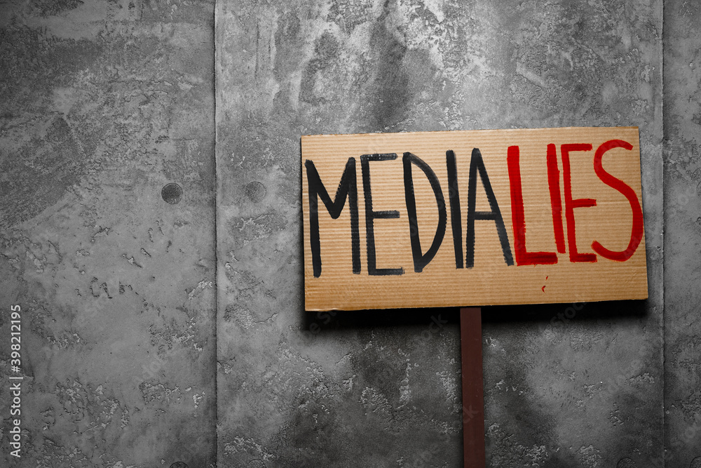 Fototapeta premium Protest placard against fake news about outbreak 2019-nCoV and treatment
