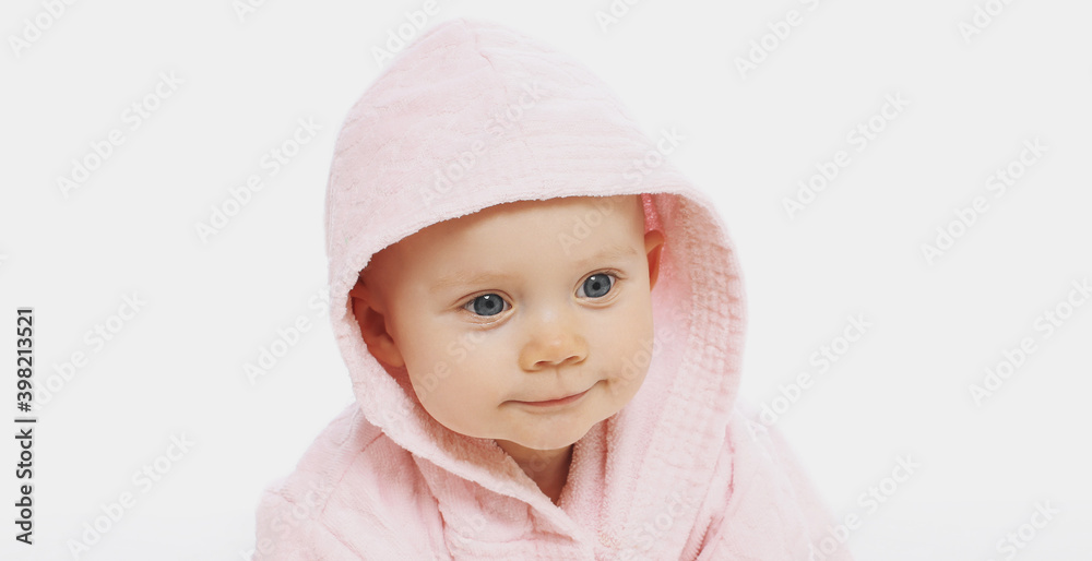 Portrait of little baby in soft pink costume over a white background Portrait of little baby in soft pink costume over a white background