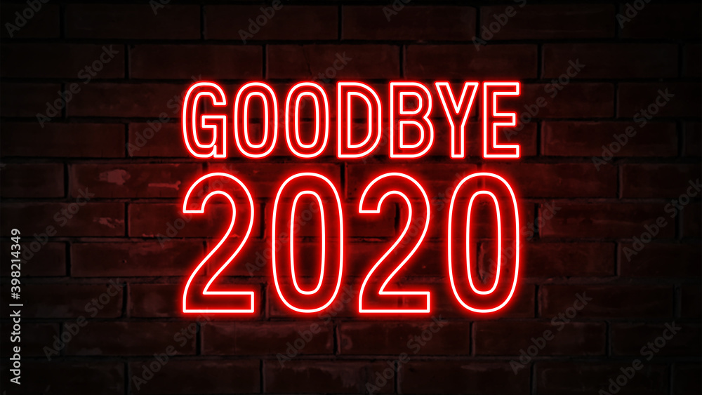 Goodbye 2020 - red neon light word on brick wall background Goodbye 2020 - red neon light word on brick wall background