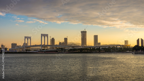 Ponte de Sai Van Bridge in the evening view from Sai Van Lake. It is a beautiful cable-stayed bridge in Macau, China