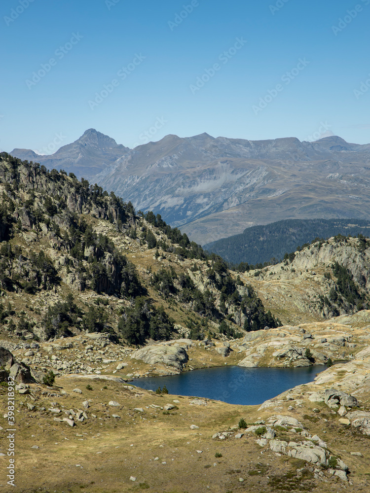 Mountainous landscape with lakes and blue sky
