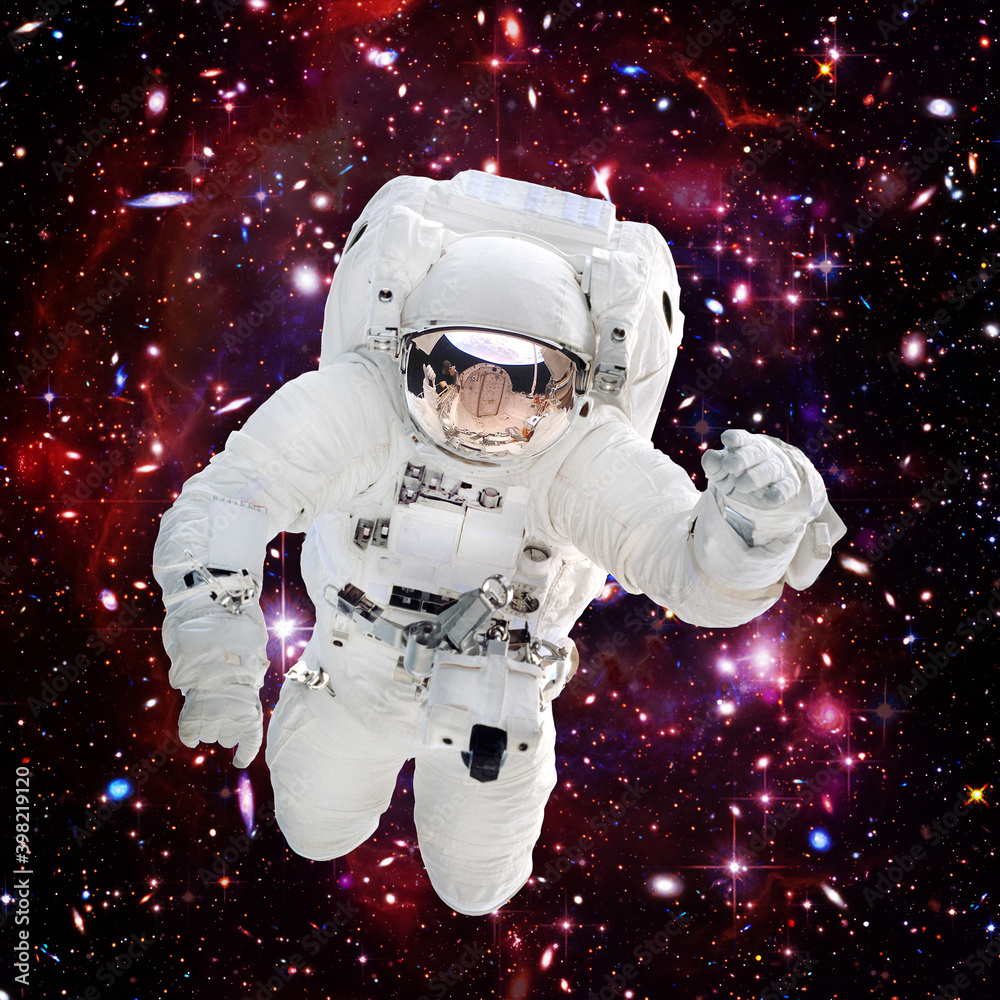 Astronaut surfing dark space. Planets stars. Space scene. The elements of this image furnished by NASA. Astronaut surfing dark space. Planets stars. Space scene. The elements of this image furnished by NASA.