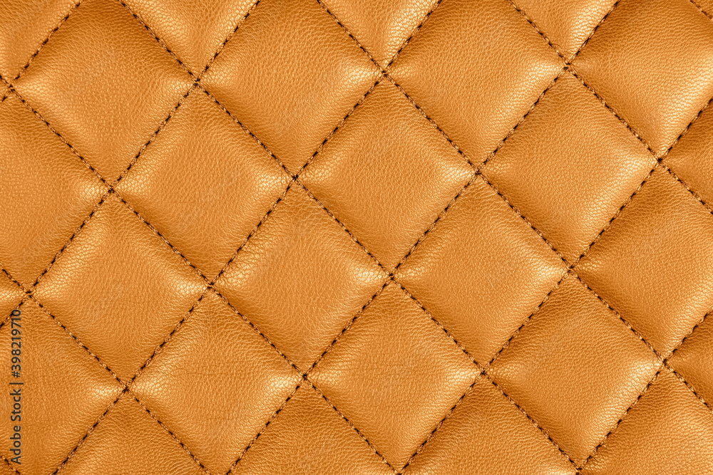 Modern luxury car brown leather interior. Part of perforated leather