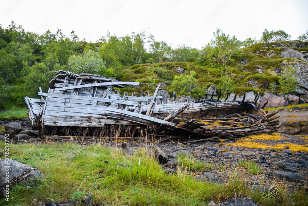Old wood shipwreck onshore, Norway Old wood shipwreck onshore, Norway