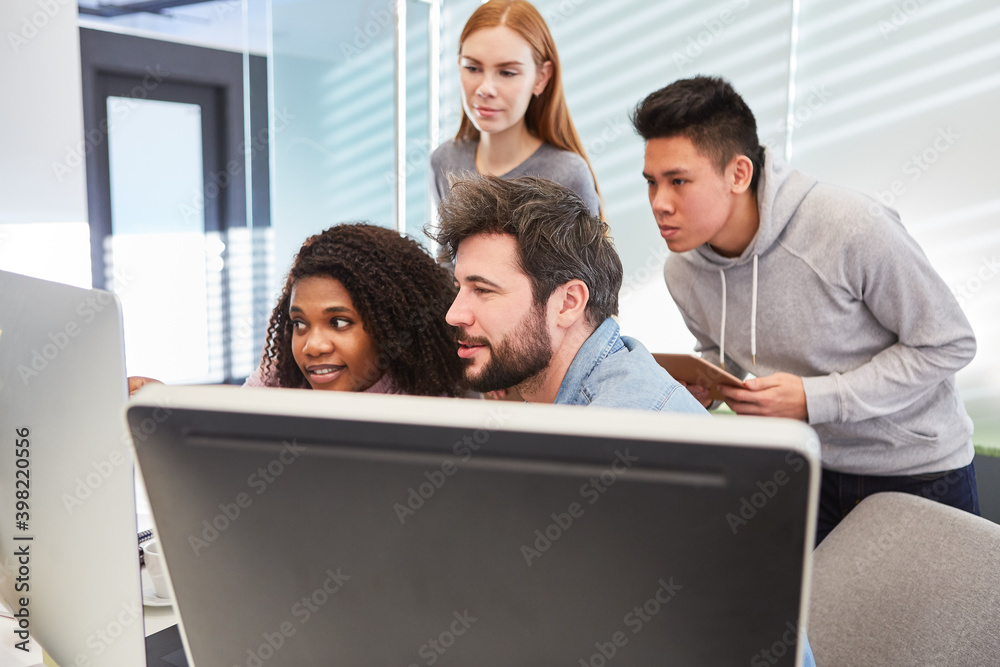 Programmer team during a computer training course Programmer team during a computer training course