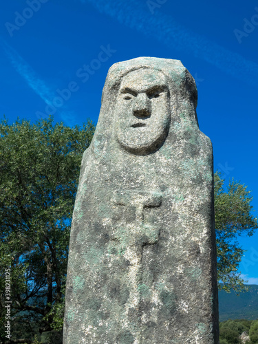 Old stone figur called menhir. Filitosa is now an open-air museum. The site was once used for religious purposes and has many stone carved figures. Corsica, France