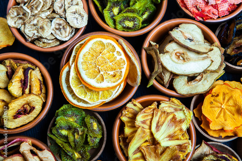 Wallpaper Mural Organic Healthy Assorted Dried Fruit Mix close up. Dried fruit snacks. dried apples, mango, feijoa, dried apricots, prunes top view Torontodigital.ca