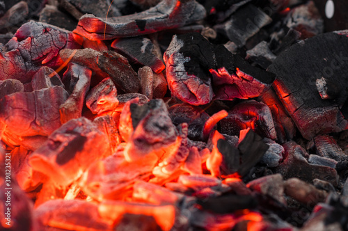 Red hot coals in the grill