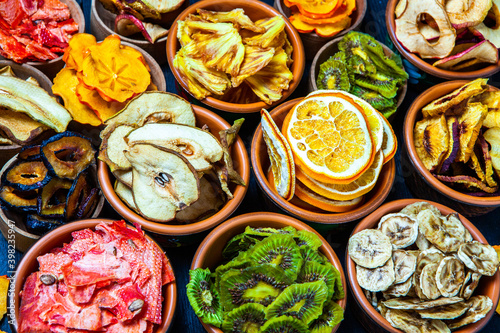 Wallpaper Mural Organic Healthy Assorted Dried Fruit Mix close up. Dried fruit snacks. dried apples, mango, feijoa, dried apricots, prunes top view Torontodigital.ca