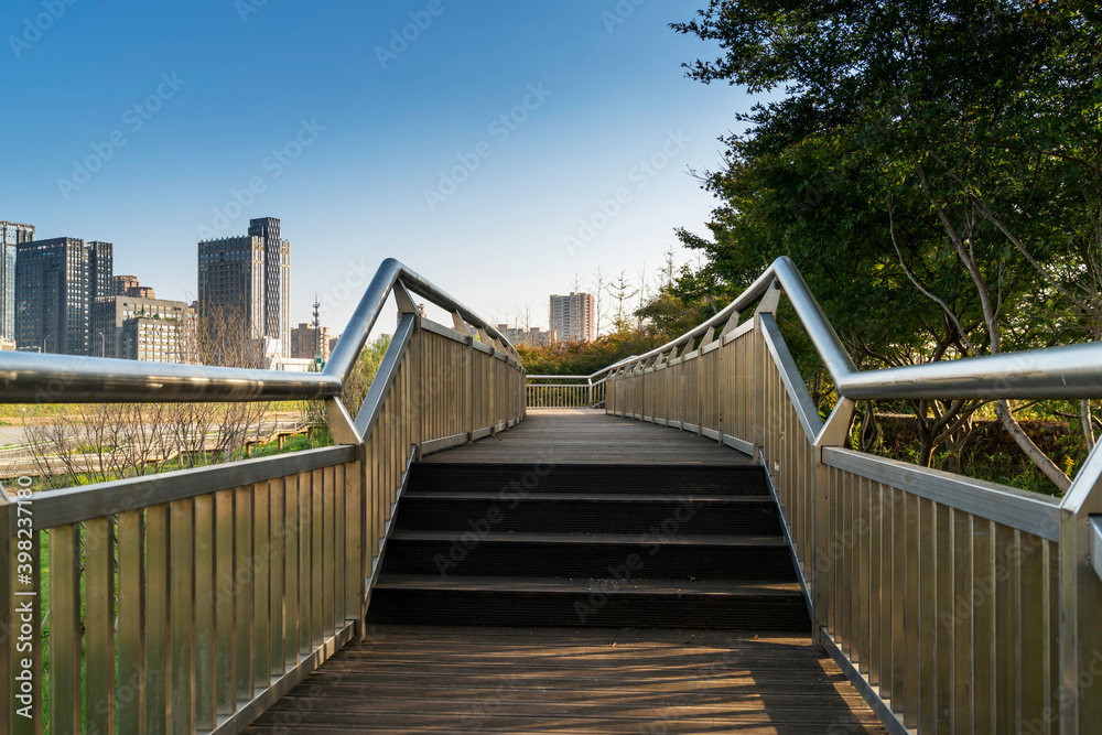 Obraz premium stairs with handrails on both sides in a park