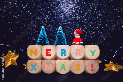 Santa Claus toy looking at the night sky and shining stars
