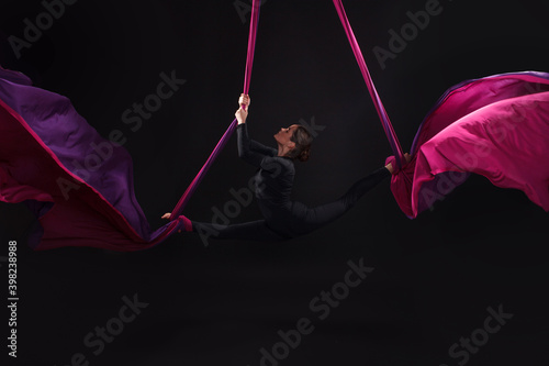 A female gymnast on gymnastic canvases