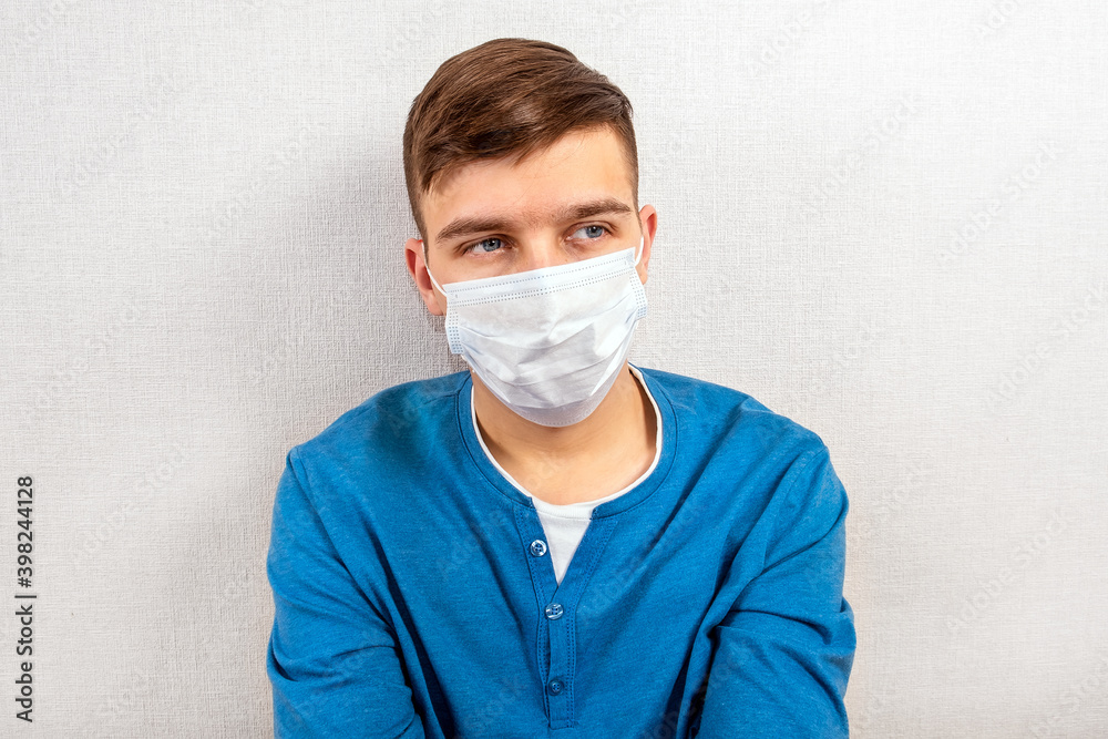 Sad Young Man in Flu Mask Sad Young Man in Flu Mask