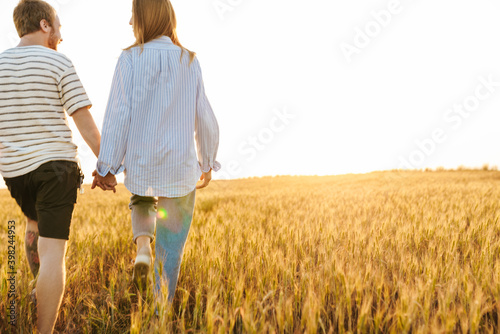 Loving couple walking together outside