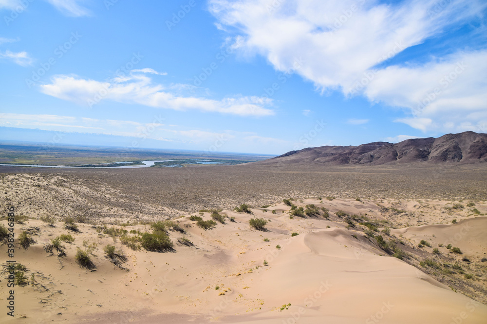 Widest view from above. Singing dune (Sand dune) in the Altyn Emel Nationalpark, Kazakhstan