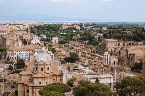 Panoramic view of city Rome with Roman forum and Colosseum from Vittoriano