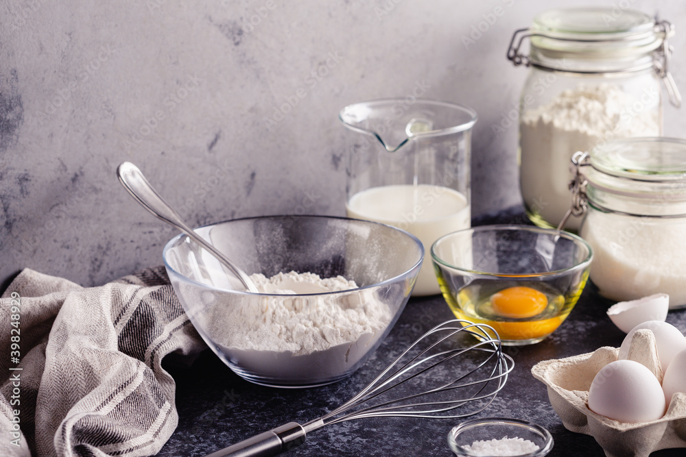 Cooking ingredients for dough, eggs, flour, sugar, milk. Cooking ingredients for dough, eggs, flour, sugar, milk.