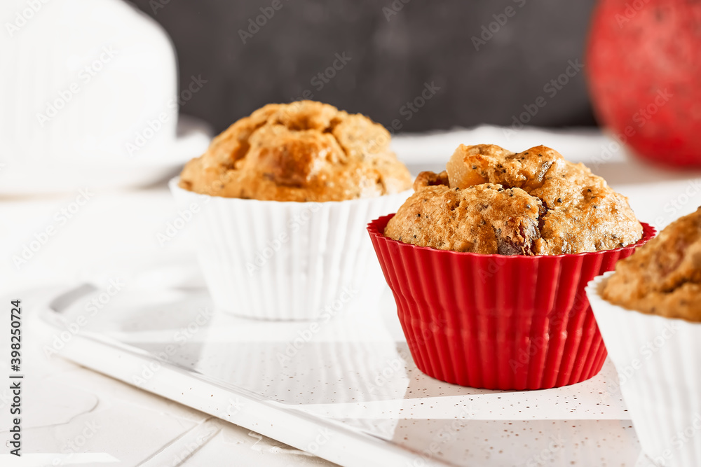Homemade muffins with ginger and nuts on white table. Healthy eating, gluten free.Homemade tasty dessert or breakfast for Valentine's day,Mother's day Homemade muffins with ginger and nuts on white table. Healthy eating, gluten free.Homemade tasty dessert or breakfast for Valentine's day,Mother's day