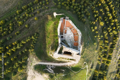 Aerial view of the ruins of an ancient medieval castle in Castrojeriz, Burgos, Spain. High quality photo. photo