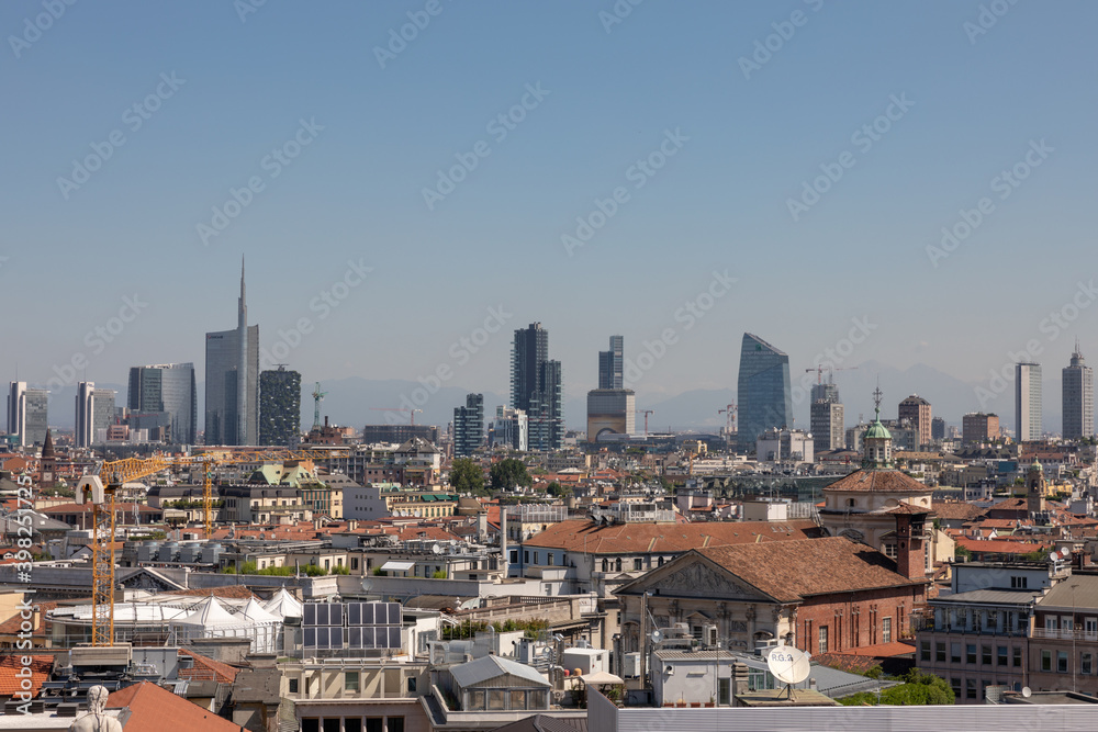 Panoramic view of Milan city with modern buildings from Milan Cathedral